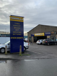 Formula First premises, parking and display banner