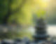 Serene-nature-scene-with-balanced-stones-representing-holistic-wellness-and-mindfulness_ed