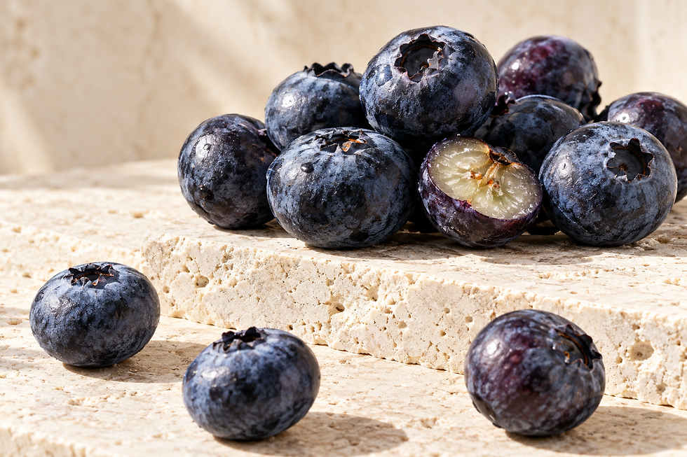 Blueberries on cream natural stone, inspiring fruity fragrance notes for a bespoke perfume