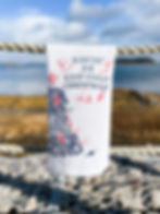 Far Far Away Shop East Coast Christmas Tea Towel Front View in navy and red