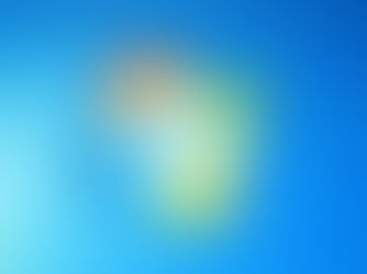 Gambar: Logo Windows 7 dengan latar belakang biru.