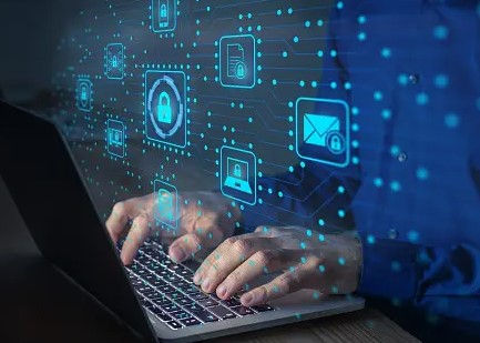 Gambar: Seseorang tengah menggunakan laptop, dan di sekelilingnya terlihat ikon-ikon digital berwarna biru yang melambangkan keamanan data seperti gembok, dokumen, atau email, yang terhubung dengan garis-garis cahaya.