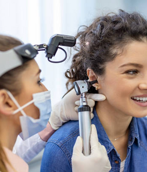 person ear is being checked bya ent specialist