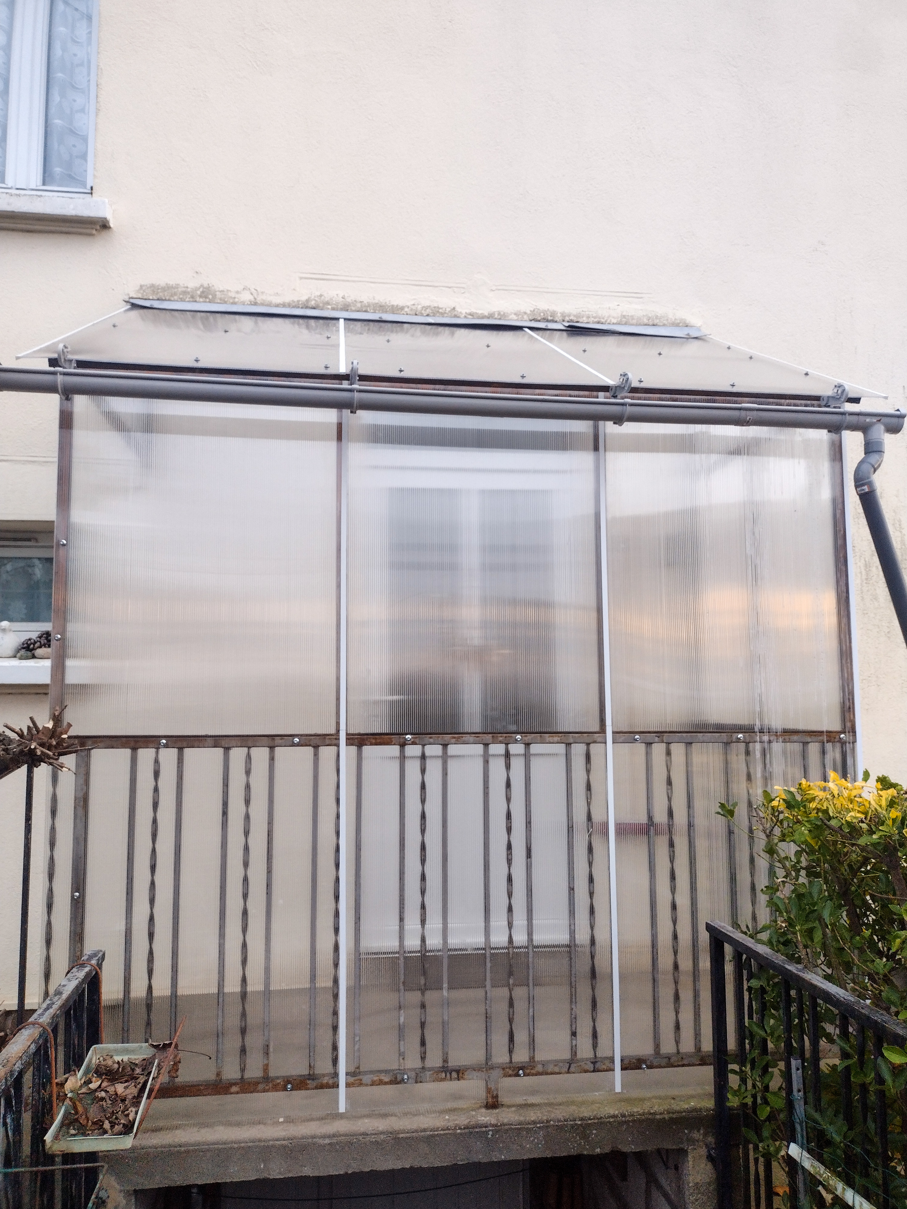 Après travaux : fermeture et protection d'un balcon
