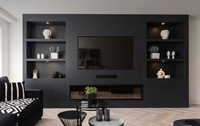 Make a statement in your living room with a custom-made media and fireplace wall that exudes elegance and functionality. With its tailored design and intelligent storage solutions, this bespoke solution seamlessly integrates your entertainment needs with a striking fireplace feature.