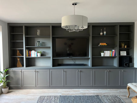 Media wall with dedicated recess for TV and soundbar, providing a streamlined entertainment experience