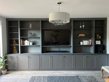 Media wall with dedicated recess for TV and soundbar, providing a streamlined entertainment experience