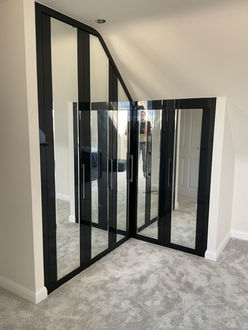 Stylish fitted wardrobe with a perfect balance of functionality and style