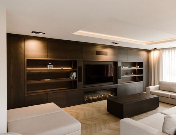 Experience the pinnacle of elegance and technology with our bespoke made-to-measure luxury media wall. This custom-designed solution seamlessly integrates your audio-visual equipment into a stunning display, while providing ample storage and organizational features for a clutter-free environment.