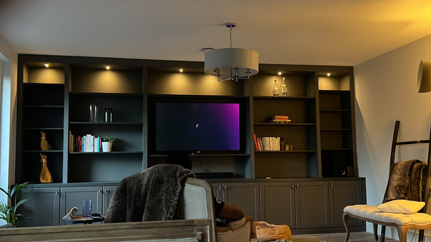 Media wall with dedicated recess for TV and soundbar, providing a streamlined entertainment experience