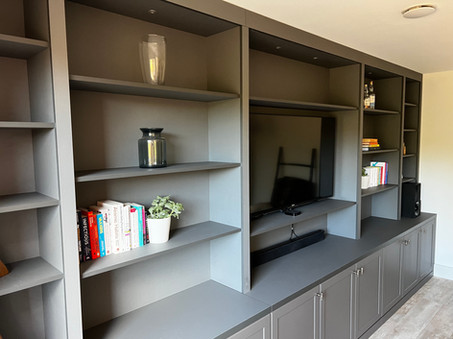 Media wall with dedicated recess for TV and soundbar, providing a streamlined entertainment experience