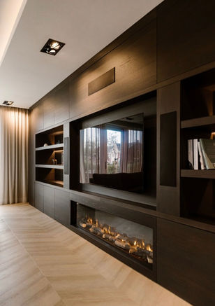 Experience the pinnacle of elegance and technology with our bespoke made-to-measure luxury media wall. This custom-designed solution seamlessly integrates your audio-visual equipment into a stunning display, while providing ample storage and organizational features for a clutter-free environment.