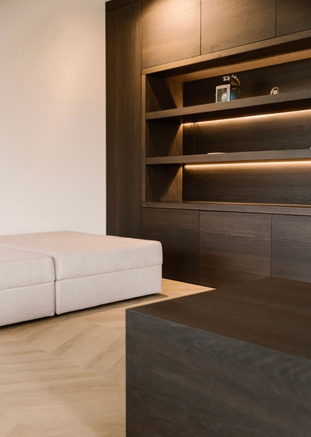 Experience the pinnacle of elegance and technology with our bespoke made-to-measure luxury media wall. This custom-designed solution seamlessly integrates your audio-visual equipment into a stunning display, while providing ample storage and organizational features for a clutter-free environment.