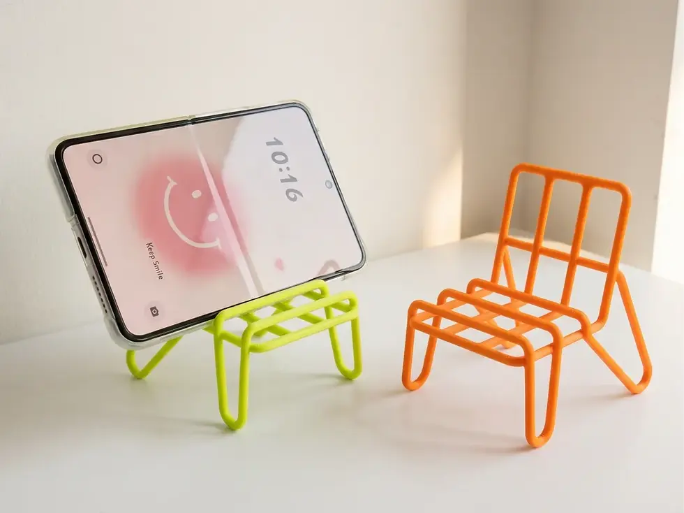 Minimalist Chair Phone Stand — primary product photo, 3D-printed tech accessory by Tactform Ventures