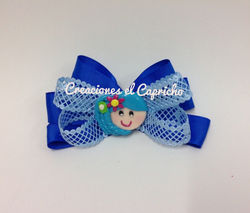 Pasador para el pelo con carita.