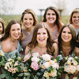 bridesmaids-portraits-flower-bouquets.jpg