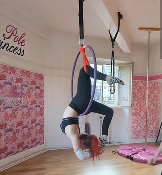 bendy cocoon shape by beginner level aerial hoop student