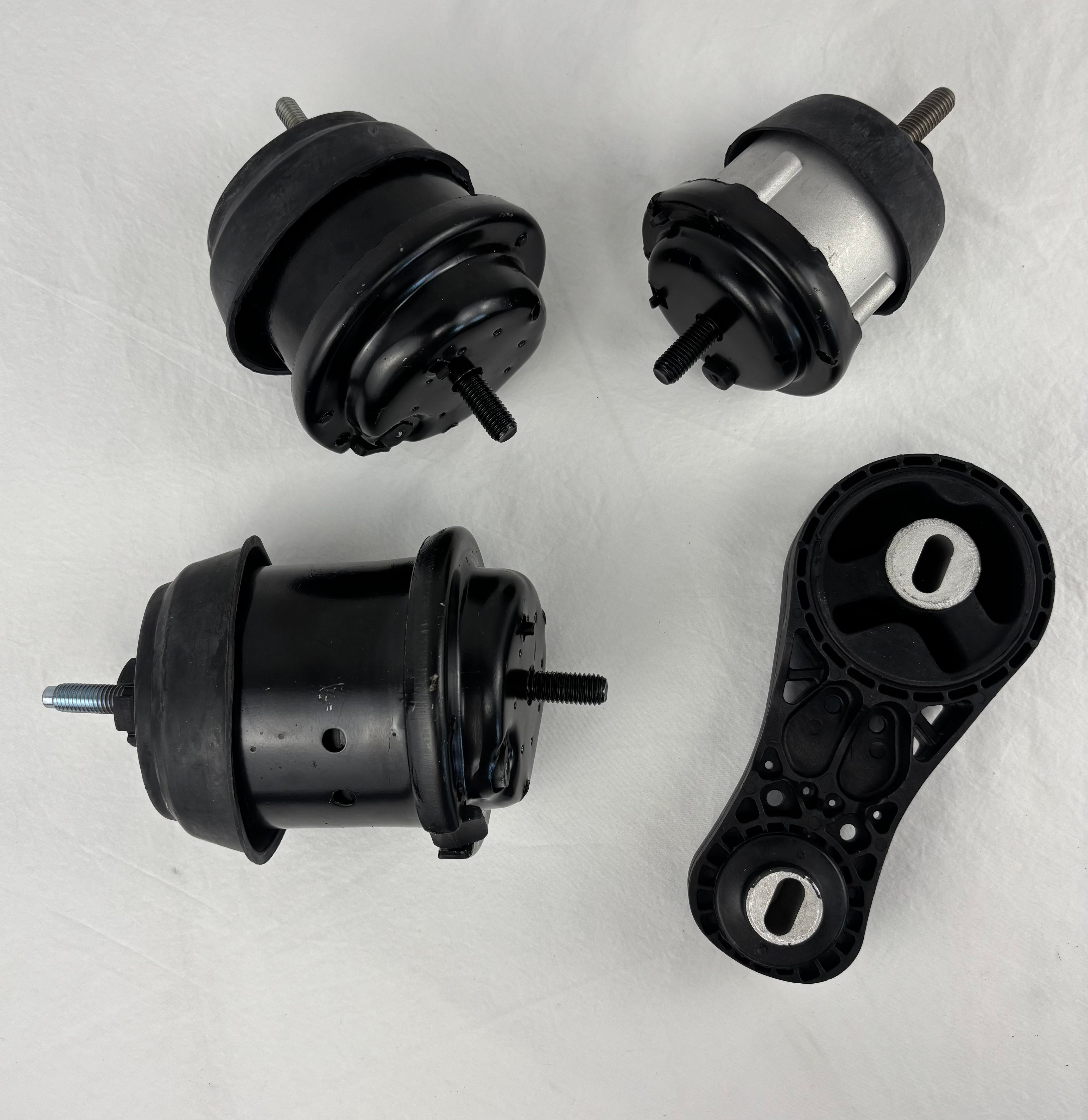 Complete four piece alloy steel and rubber engine motor and transmission mount kit for midsize SUVs.