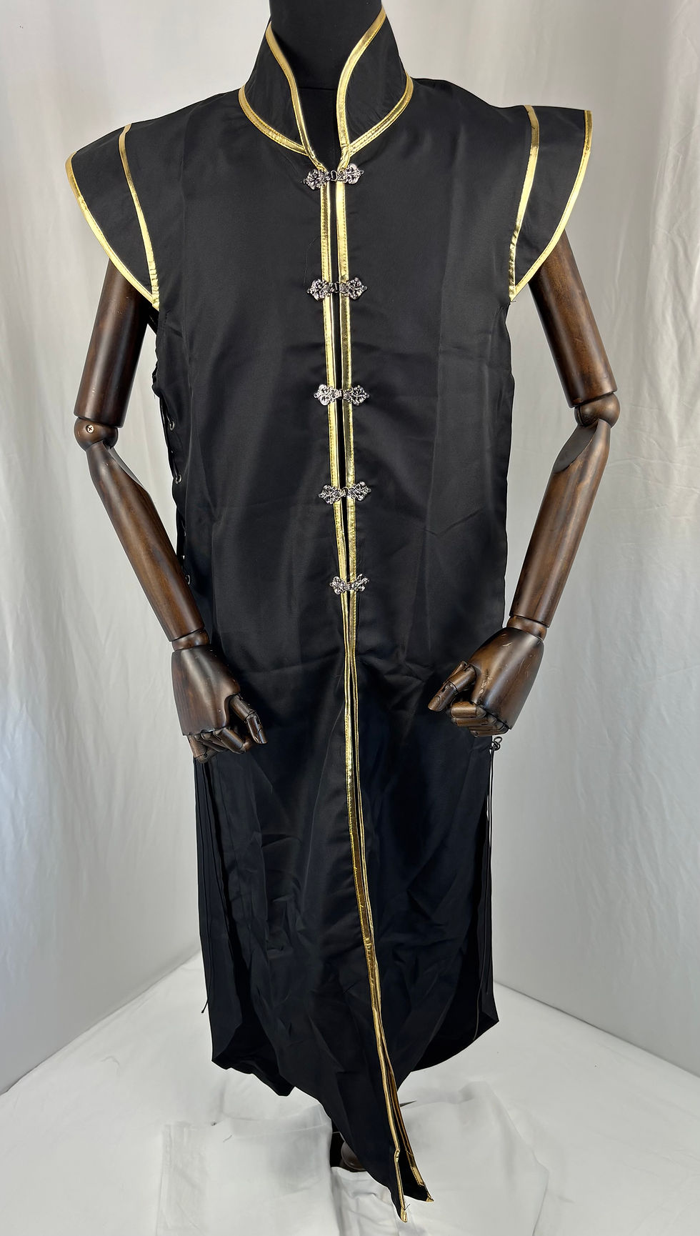 Front view of the mens medieval long vest showing the front metal clasps and sleeveless tabard silhouette.