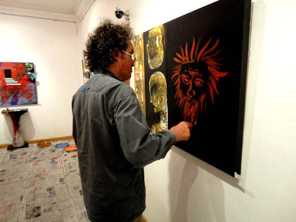 Sculptor from Australia interacting with painting
