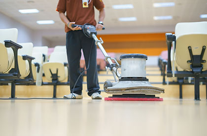 asian-worker-cleaning-ground-surface-min