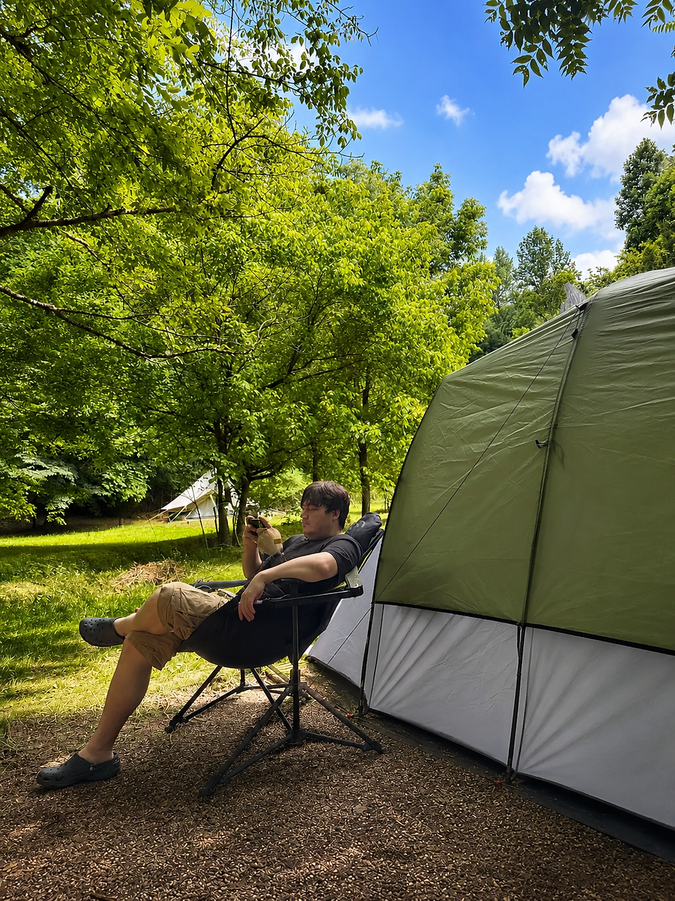 Relaxed tent camping scene at Creekside 26
