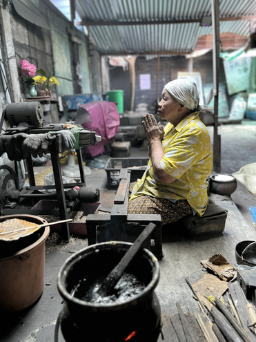 Artisan craftswoman working in workshop