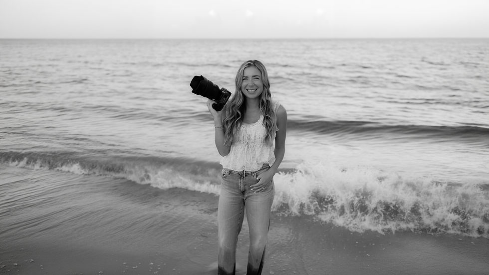 South Florida photographer holding camera on Fort Lauderdale Beach