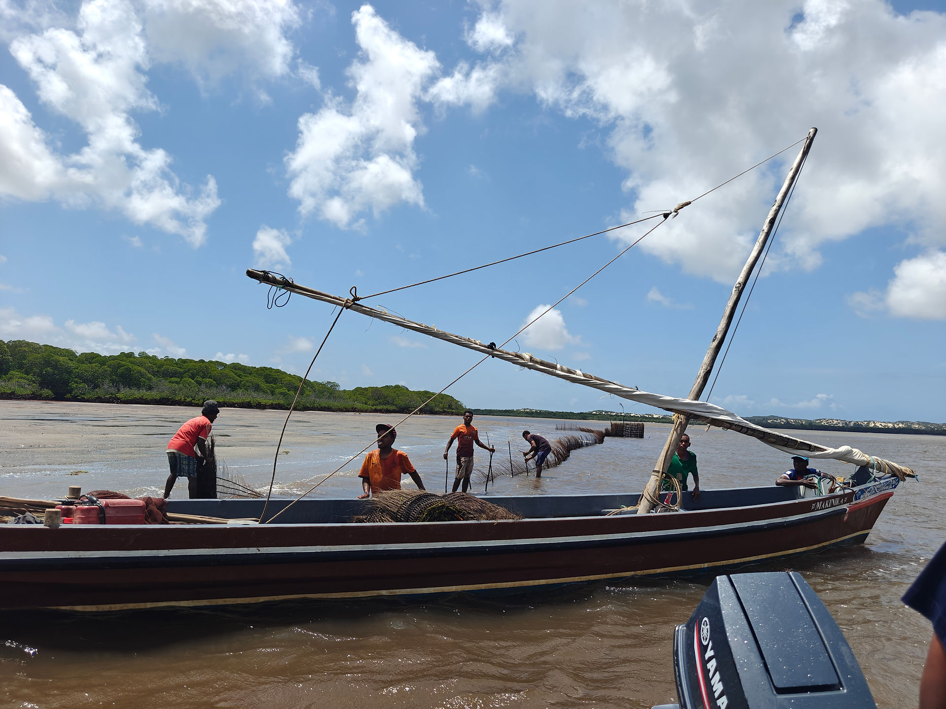 LaMCoT team on ocean patrol inspecting Lamu community fishing methods