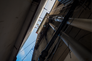 Looking up an alleyway giving a glimpse of hope