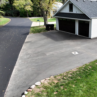 Gavers Pavers, Inc. New Asphalt install that has proper pitch for water drainage in Lauderdale Lake WI