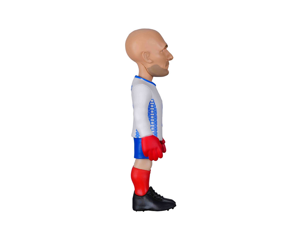 Miniatura: Vue de profil droit de la figurine de collection Barthez Minix en posture de gardien de but sur sa ligne.