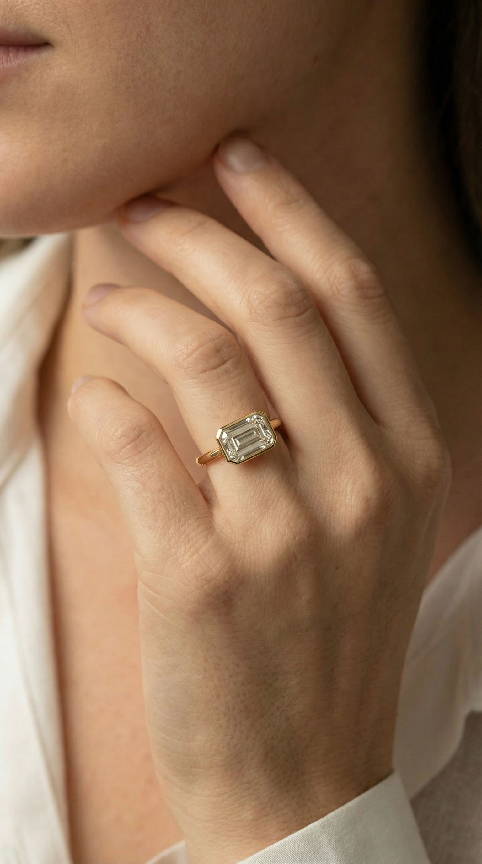 Emerald Cut Diamond East-West Bezel Setting Custom Engagement Ring