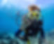 Female scuba diver underwater showing ok signal.jpg