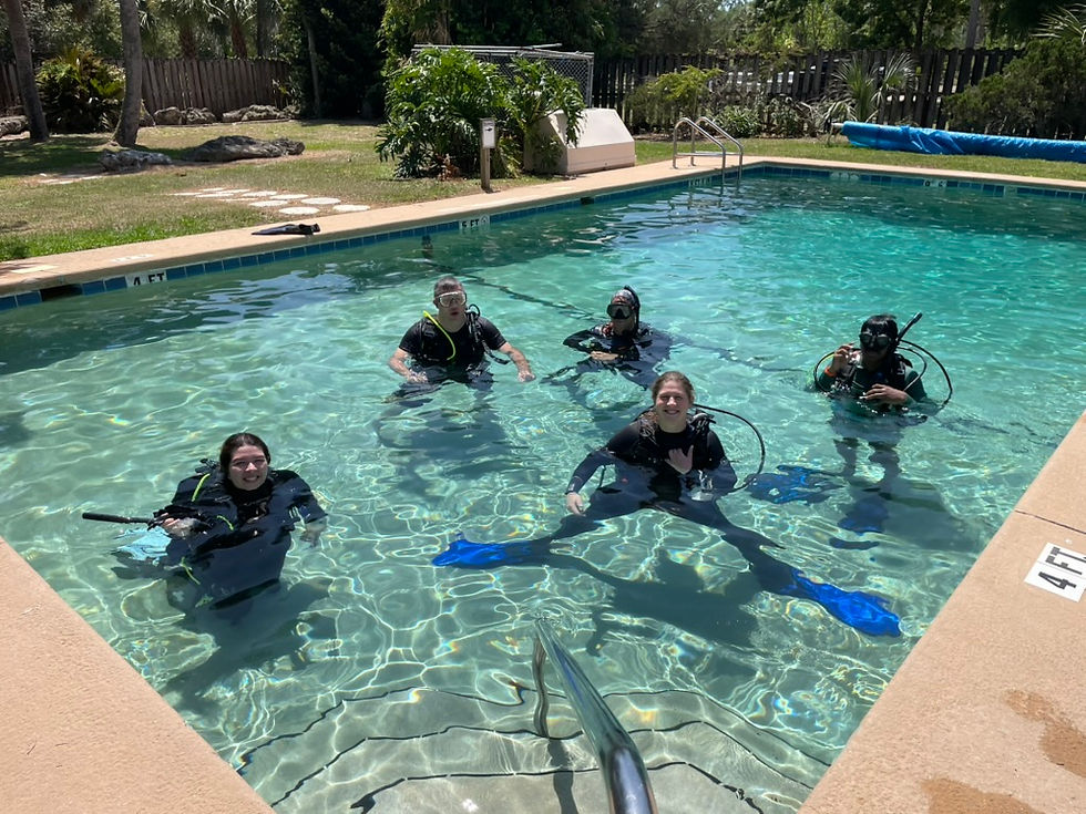 Close-up view of a diver practicing mask clearing in a swimming pool