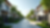 Eye-level view of a tree-lined street in a gated community with modern homes