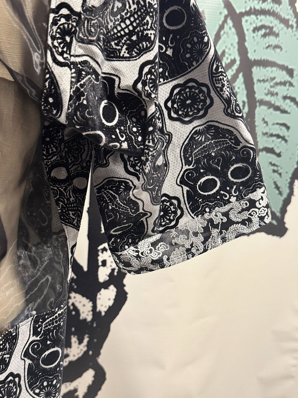 Thumbnail: Black Sugar Skulls on Gray Men's Button Up sheer back panel and sheer upper