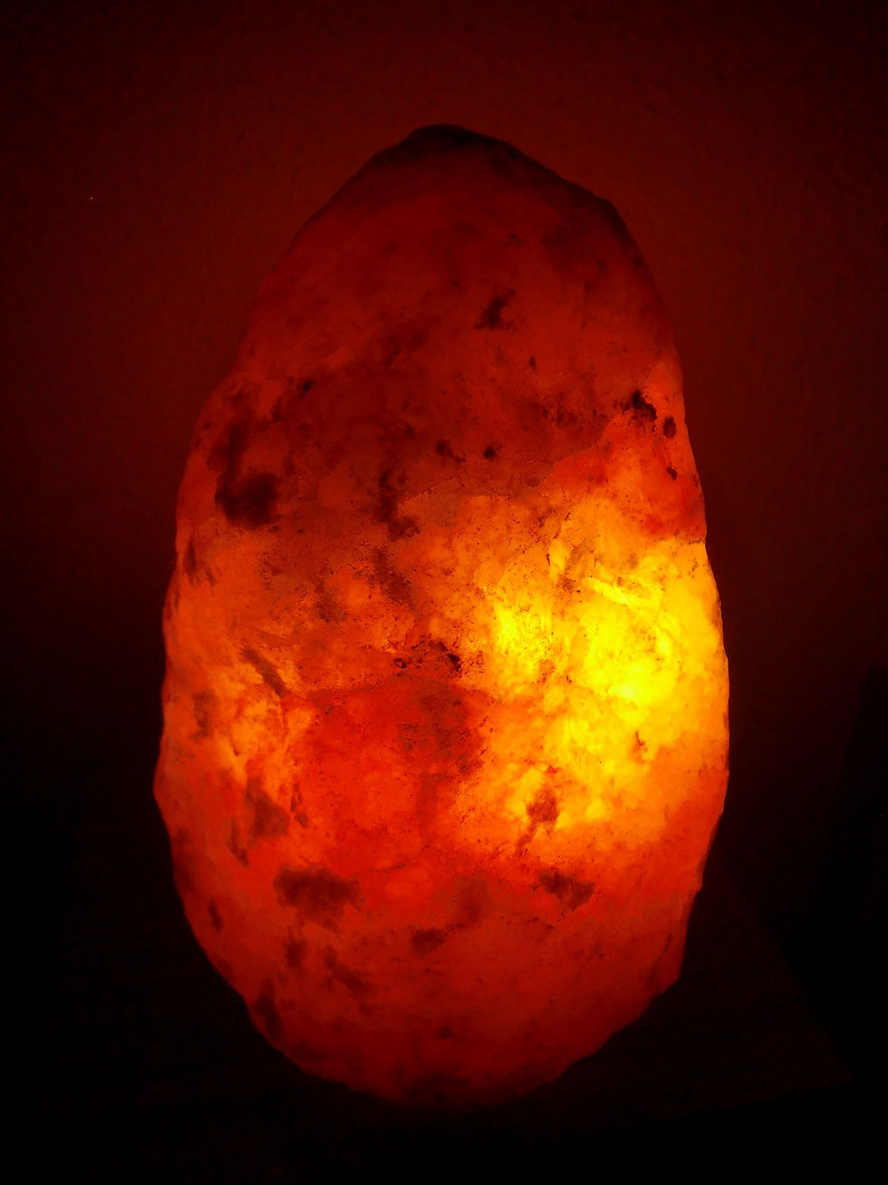 Glowing pink & orange hue from Himalayan salt lamp