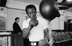 800-miles-davis-working-out-with-a-long-speed-bag-at-gleason-s-gym,-nyc,-1970-(i)-3080-2-1