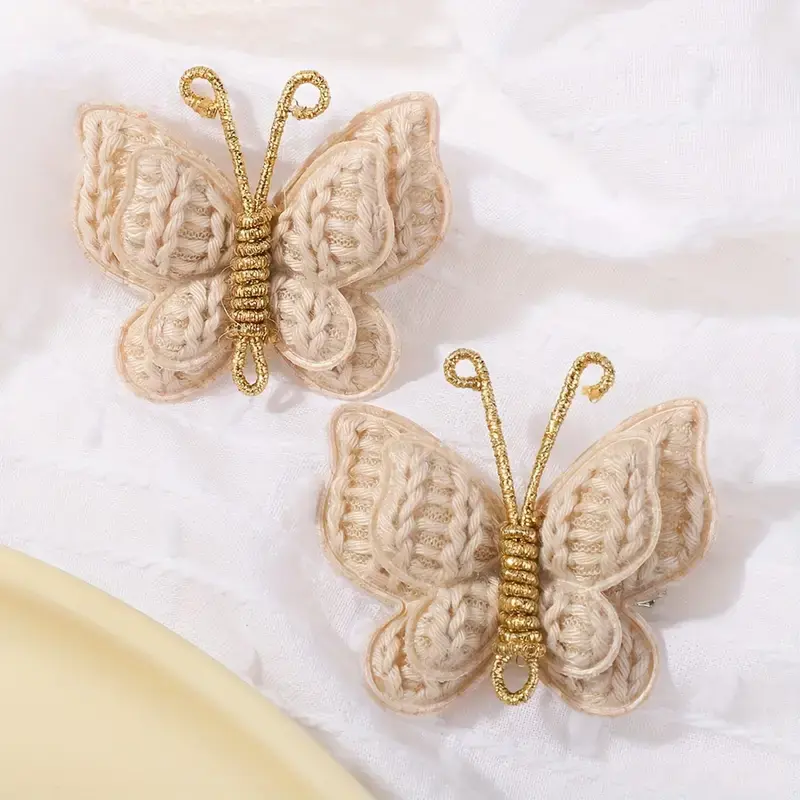 Thumbnail: Gebreide vlinder haarclips