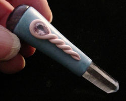 crystal chrysalis clear crystal point wand accented with natural amethyst