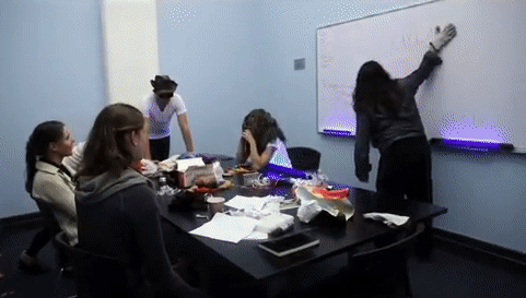 repeating video gif montage of a carousel, and a whiteboard exercise from Brooklyn NY that was part of an interactive theater performance performance by the Institute for Psychogeographic Adventure.