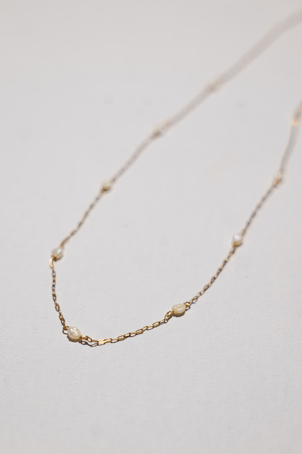 Thumbnail: Petite freshwater pearl gold chain necklace