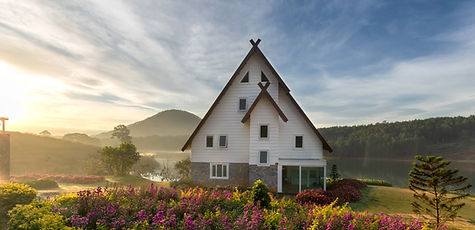 white and gray painted house with meadow of lavender_edited.jpg