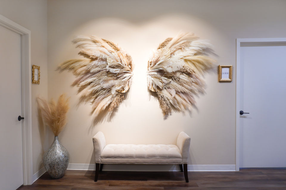 A beautiful angel wing wall display custom built by Megan Lipke