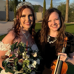 Lindsey with a Couple at a Wedding
