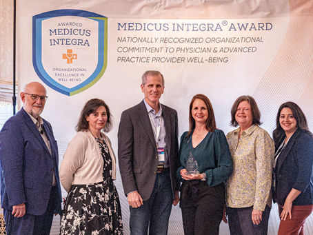 Representatives from the Coalition for Physician & APP Well-Being and CHRISTUS Trinity Clinic pose for the Medicus Integra® Award Ceremony.