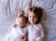 A Toddler and a Baby