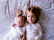 A Toddler and a Baby