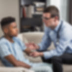 psychiatrist attending to a young male adult behavioral health patient.jpg